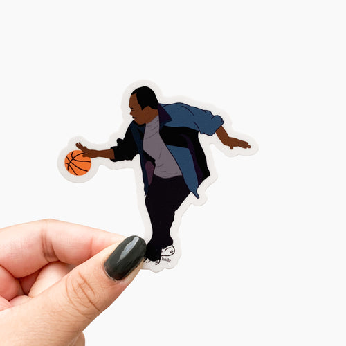 A sticker of a funny scene from the television show, The Office, where Stanley plays basketball or at least tries to.