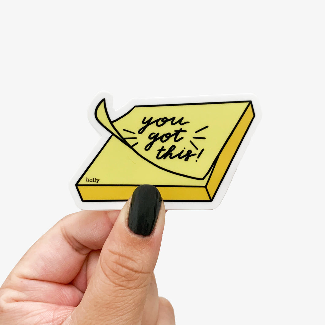 A bright sticker featuring yellow post it notes and one peeling off on top with text that reads, You got this!