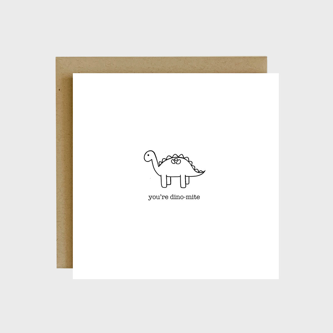 A funny greeting card featuring a dinosaur and text that reads, you're dino-mite.